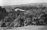 4IH A Stanier 2-6-2 tank crossing Healey Dell Viaduct with a Rochdale-Bacup train in the last week of operation in 1947. W A Camwell.